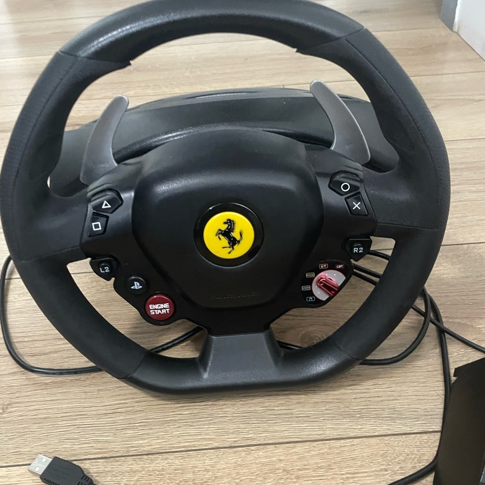 Ferrari Black Steering Wheel with Red and Silver Details